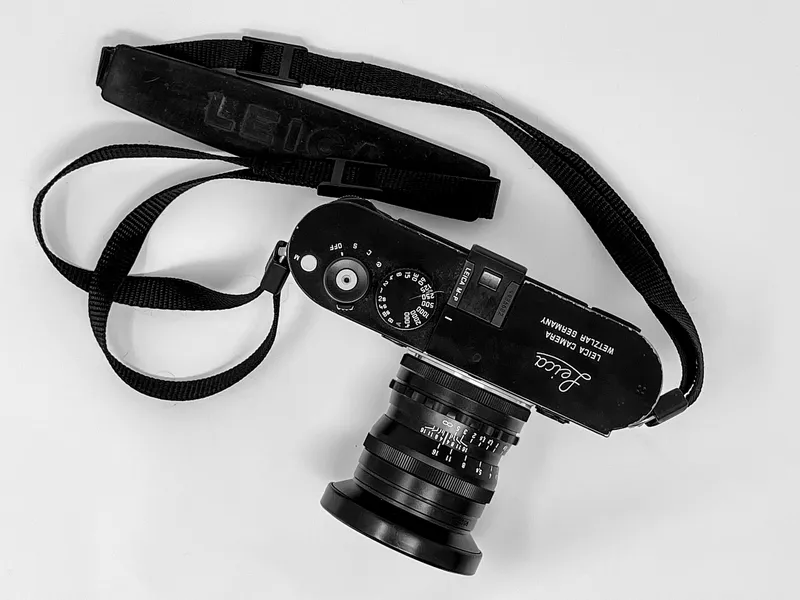 A rangefinder camera with its strap