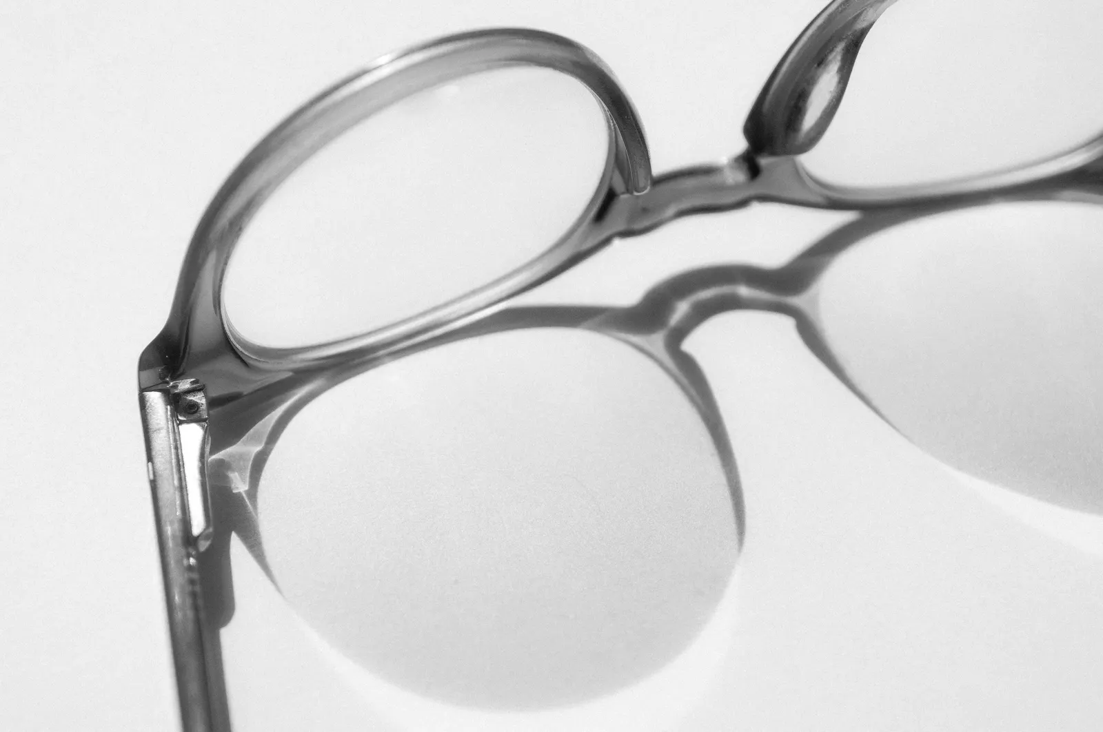 Close up of a clear acetate frame and its hinge