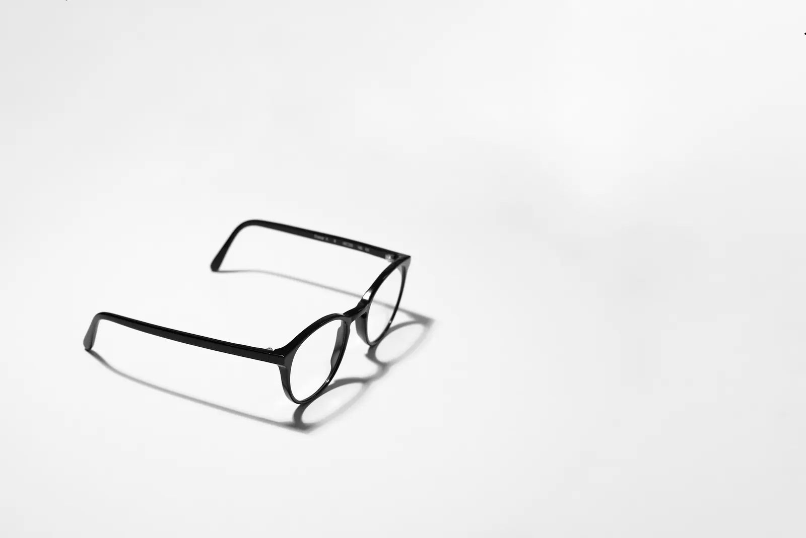 Black frames casting a long shadow on white