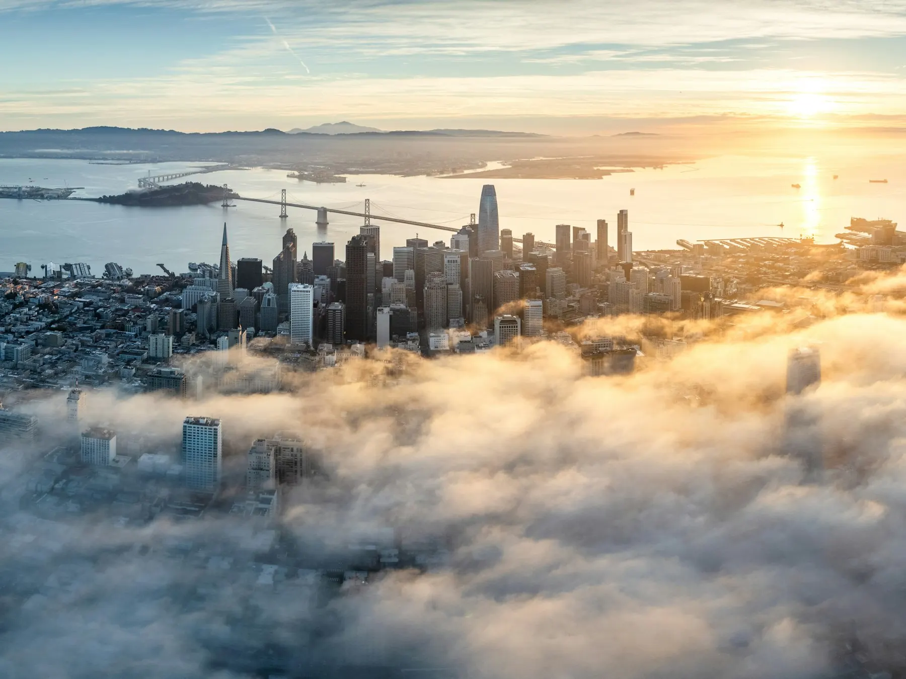 City skyline half hidden in morning fog