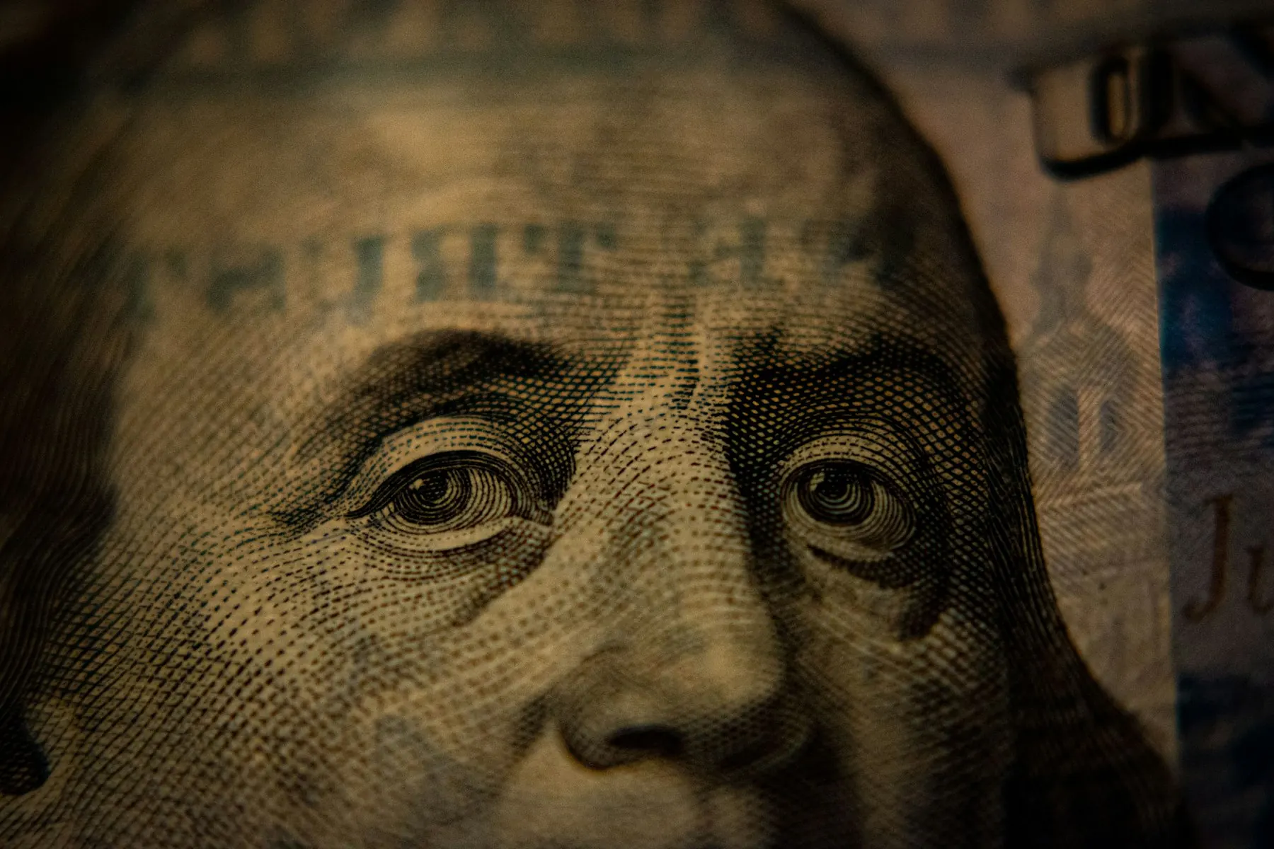 Engraved portrait detail from a hundred-dollar bill